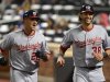 Washington Nationals' Ian Desmond, left, and Michael Morse return to the dugout after Desmond drove in Morse with a two-run home run in the fourth inning of the baseball game against the New York Mets in New York, Monday, Sept. 10, 2012. (AP Photo/Henny Ray Abrams)