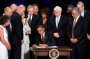 File photo of U.S. President Barack Obama signing the Dodd-Frank Wall Street Reform and Consumer Protection Act in Washington