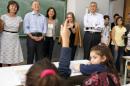 World Bank President Jim Yong Kim meets with Syrian children refugees at a classroom inside a school in Burj Hammoud, north of Beirut