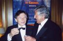 FILE - This 2002 file photo shows Roman Polanski, left, director of "The Pianist" with co-producer Gene Gutowski at the film festival in Cannes, France. Gutowski produced three of Polanski's now classic films in the 1960s and the two reunited decades later to make "The Pianist." On Thursday, a new documentary about Gutowski's improbable wartime survival premieres at the Warsaw Film Festival, directed and produced by his son, Adam Bardach. (AP Photo/Adam Bardach, File)