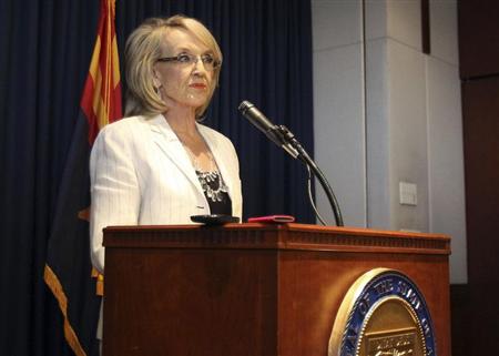 Arizona Governor Jan Brewer addresses the media about the Supreme Court's decision on SB1070 in Phoenix, Arizona, June 25, 2012. REUTERS/Darryl Webb