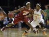 Arkansas' C'eira Ricketts (22) works the ball while defended by Tennessee's Briana Bass (1) in the first half of an NCAA college basketball game on Thursday, Feb. 23, 2012, in Knoxville, Tenn. (AP Photo/Wade Payne)