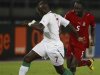 Kamissoko of Equatorial Guinea challenges Sow of Senegal during their African Nations Cup Group A soccer match at Estadio de Bata