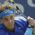 Rafael Nadal of Spain returns a shot to David Nalbandian of Argentina during the U.S. Open tennis tournament in New York, Sunday, Sept. 4, 2011. (AP Photo/Charlie Riedel)