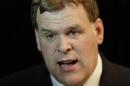 Canadian Minister of Foreign Affairs John Baird speaks to The Associated Press at the 10th International Institute for the Strategic Studies in Manama, Bahrain, Saturday, Dec. 6, 2014. (AP Photo/Hasan Jamali)