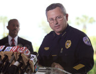 FILE - In this March 22, 2012 file photo, Sanford Police Chief Bill Lee speaks to the the media during a news conference as city manager Norton Bonaparte Jr. listens at left, in Sanford Fla. The Sanford City Commission on Monday, April 23, 2012 rejected by a 3-2 vote the resignation of Lee, who was roundly criticized for not initially charging Zimmerman and had stepped down temporarily in March he said to let emotions cool. (AP Photo/Julie Fletcher, File)