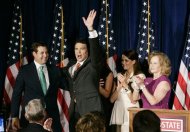 Texas Governor Rick Perry waves as he announces his presidential bid, in Charleston, South Carolina, August 13, 2011. REUTERS/Maryann Chastaine
