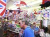A shopper browses jubilee decorations for sale in a newsagents in Stoke Newington, east London