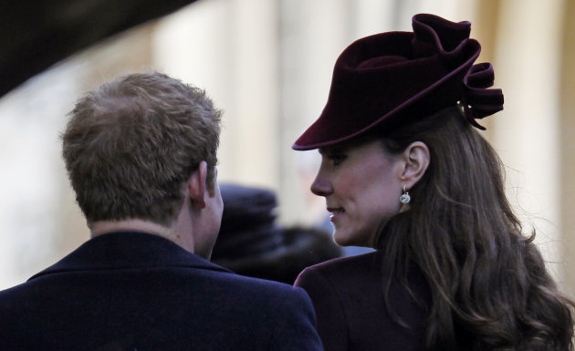 Kate, Duchess of Cambridge, right, speaks with Britain's Prince Harry as they arrive arrive to attend a Christmas Service with other members of the royal family at St. Mary's church in the grounds of Sandringham Estate, the Queen's Norfolk retreat, England, Sunday, Dec. 25, 2011. (AP Photo/Lefteris Pitarakis)