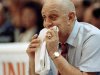 FILE - In this April 2, 1990, file photo, UNLV coach Jerry Tarkanian chews on his towel while watching his Runnin' Rebels run over Duke University in the championship game of the Final Four in Denver. A Las Vegas hospital spokeswoman says doctors have decided to keep storied former UNLV basketball coach Tarkanian overnight for observation after a mild heart attack. Mountainview Hospital spokeswoman Amanda Powell said Tarkanian's status had not changed despite the change from plans to release him on Wednesday, March 21, 2012. (AP Photo/Ed Reinke, File)