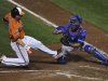 Orioles base runner Taylor Teagarden is tagged out by Toronto Blue Jays catcher J.P. Arencibia in the sixth inning in their second game of a double header