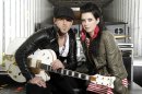 FILE - In this Oct. 27, 2011 photo, musicians Keifer Thompson, left, and Shawna Thompson, of the group Thompson Square, pose for a portrait in Los Angeles. The husband-wife team are canceling their upcoming performances after Shawna Thompson's father died Thursday, Feb. 23, 2012 in Alabama. (AP Photo/Matt Sayles, file)
