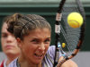 Italy's Sara Errani returns the ball to Arantxa Rus, of The Netherlands, during their first round match of the French Open tennis tournament at the Roland Garros stadium Sunday, May 26, 2013 in Paris. (AP Photo/Michel Euler)