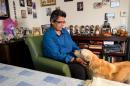 Disabled veteran Gloria Montes now lives in a studio apartment with her beloved dog Cache