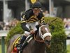 Oxbow with jockey Stevens in the irons takes first place at the 138th running of the Preakness Stakes at Pimlico Race Course in Baltimore