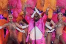 Cee Lo Green performs with the Jubilee! showgirls during the Caesars Entertainment 