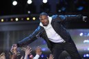 Presenter Nick Cannon arrives on the stage during the Cartoon Network's Hall of Game Awards in Santa Monica, California