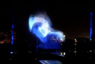 The image of golf world number one Rory McIlroy is projected on water, after he has been unveiled as a new Brand Ambassador for Nike during a press conference in Abu Dhabi, United Arab Emirates, Monday, Jan. 14, 2013. (AP Photo/Manuel Salazar)