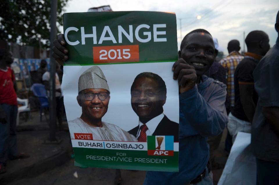 Supporters of  All Progressives Congress (APC) celebrate on March 31, 2015 in Lagos