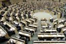 Jordanian Members of Parliament take part in a vote on March 18, 2014 in Amman