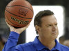 Kansas head coach Bill Self passes a ball during a practice session for the NCAA Final Four basketball tournament Friday, March 30, 2012, in New Orleans. Kansas plays Ohio State in a semifinal game on Saturday. (AP Photo/David J. Phillip)