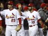 St. Louis Cardinals' Carpenter and Freese celebrate with their teammates after defeating the San Francisco Giants in Game 3 of their MLB NLCS playoff baseball series in St. Louis