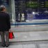 A man looks at an electronic stock board outside a securities firm Monday, June 3, 2013, in Tokyo.  Uncertainty about the U.S. Federal Reserve's next course of action and a sharp, sudden plunge on Wall Street sent Asian stock markets lower Monday. Japan’s Nikkei 225 index lost 2.2 percent to 13,475.64, echoing U.S. stock markets losses Friday. The Dow dropped more than 200 points, its worst drop in six weeks.  (AP Photo/Junji Kurokawa)