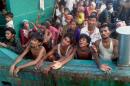 Rohingya migrants on a boat off the southern Thai island of Koh Lipe in the Andaman Sea on May 14, 2015