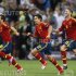 Spain's Jordi Alba, Jesus Navas and Sergio Ramos celebrate after defeating Portugal in their Euro 2012 semi-final soccer match in Donetsk