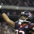 Houston Texans running back Foster celebrates after scoring a touchdown against the Cincinnati Bengals during the third quarter of their NFL AFC wildcard playoff football game in Houston