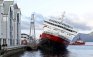 The MS Nordlys cruise liner at the quayside in Aalesund, Norway, early Friday Sept. 16, 2011. An intense fire in a cruise ship's engine room has killed two crewmen, injured nine others and forced more than 200 passengers to evacuate a popular cruise off Norway's craggy western coast. Three rescue workers were hospitalized with minor injuries. Police said they suspected an explosion in the engine room in Thursday's fire. (AP Photo/Hakon Mosvold Larsen, Scanpix Norway) NORWAY OUT