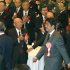 In this photo taken Monday, Jan. 7, 2013. Japanese Prime Minister Shinzo Abe, second from right, arrives for Japan's business organizations' joint New Year's party in Tokyo. Japan's ruling Liberal Democratic Party was in the final stages of drafting fresh stimulus spending Thursday, Jan. 10, reportedly totaling more than 20 trillion yen ($227 billion), rushing to fulfill campaign pledges to break the world's third-biggest economy out of its deflationary slump. Economy minister Akira Amari and Abe discussed details of the proposed stimulus package ahead of an announcement expected on Friday, officials said. (AP Photo/Shizuo Kambayashi)