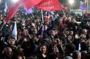 Syriza supporters celebrate following victory