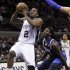 San Antonio Spurs Leonard beats Dallas Maverick Crowder during the first half of their NBA basketball game in San Antonio