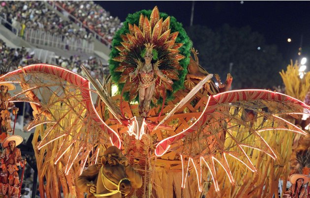 A reveller from the Salgueiro samba school takes part in a parade on the second night of the annual Carnival parade in Rio de Janeiro's Sambadrome
