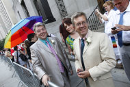 Richard Skipper, left, and Daniel Sherman, of Sparkill, N.Y., wait to get married at the Manhattan City Clerk's office, Sunday, July 24, 2011, in New York. (AP Photo/Jason DeCrow)