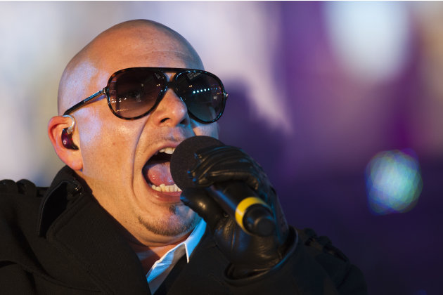Pitbull performs in Times Square during New Year's Eve celebrations, Saturday, Dec. 31, 2011, in New York. (AP Photo/Charles Sykes)