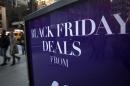 A sign along 5th Ave is pictured during Black Friday Sales in New York