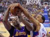 Los Angeles Clippers center Ryan Hollins, right, blocks the shot of Los Angeles Lakers center Dwight Howard during the first half of their NBA basketball game, Sunday, April 7, 2013, in Los Angeles. (AP Photo/Mark J. Terrill)