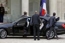 Google executive chairman Eric Schmidt, second from right, arrives at the Elysee Palace for a meeting with French President Francois Hollande, in Paris, Monday Oct. 29, 2012. (AP Photo/Remy de la Mauviniere)