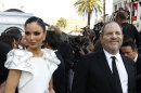 Eve Chilton Weinstein, left and Harvey Weinstein arrive before the 84th Academy Awards on Sunday, Feb. 26, 2012, in the Hollywood section of Los Angeles. (AP Photo/Chris Carlson)