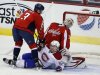 Capitals goalie Neuvirth reacts after Desharnais of Montreal Canadiens crashed the crease during NHL hockey game in Washington
