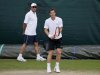 Andy Murray of Britain trains with his coach Ivan Lendl during a training session at the Wimbledon Tennis Championships, in London