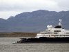 FILE - In this Monday, Jan. 31, 2011 file photo, an helicopter floats on the water close to the Octopus yacht, owned by Microsoft's co-founder Paul Allen, at Ushuaia port, some 3,300 km, about 2045 miles, south of Buenos Aires, Argentina. The Octopus, a mega-yacht owned by Allen, who visited Guam about a week ago, is in the search for a missing Cessna carrying an American pilot and two Palau police officers that was dispatched to track a larger Chinese boat.(AP Photo/Alejandro Madril, File)