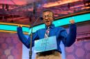 Dev Jaiswal, 13, of Jackson, Miss. reacts as he correctly spelled "bouclé" during the semifinals of the 2015 Scripps National Spelling Bee, Thursday, May 28, 2015, in Oxon Hill, Md. (AP Photo/Andrew Harnik)