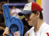 New York Giants quarterback Eli Manning holds up a foam finger during Media Day for NFL football's Super Bowl XLVI Tuesday, Jan. 31, 2012, in Indianapolis. (AP Photo/Eric Gay)