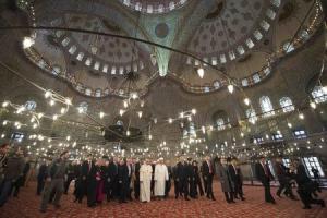 Pope Francis is shown the Sultan Ahmet mosque, popularly known as the Blue Mosque, by Mufti of Istanbul, Rahmi Yaran, during his visit to Istanbul