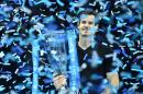 Britain's Andy Murray celebrates with the trophy after winning the men's singles final on the eighth and final day of the ATP World Tour Finals tennis tournament in London November 20, 2016