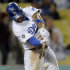Los Angeles Dodgers' Matt Kemp hits a single to center field in the sixth inning of a baseball game against the Pittsburgh Pirates, Saturday, Sept. 17, 2011, in Los Angeles. (AP Photo/Gus Ruelas)