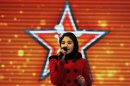 Afghan's Latifa Azizi performs on the "Afghan star" talent show in Kabul